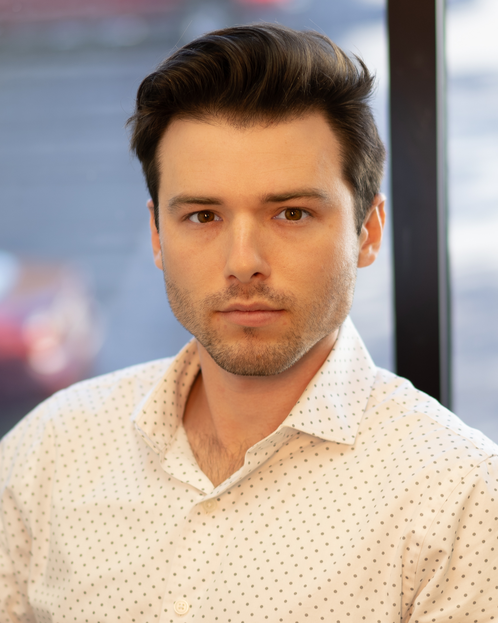 Professional headshot of Jonny Griffin, a real estate agent at Enabl Realty.